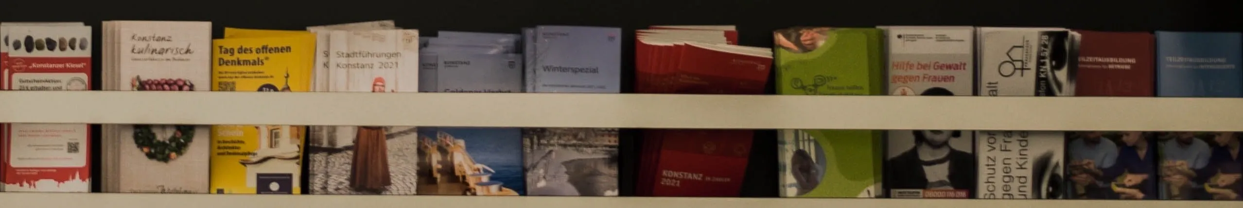 brochures on shelf