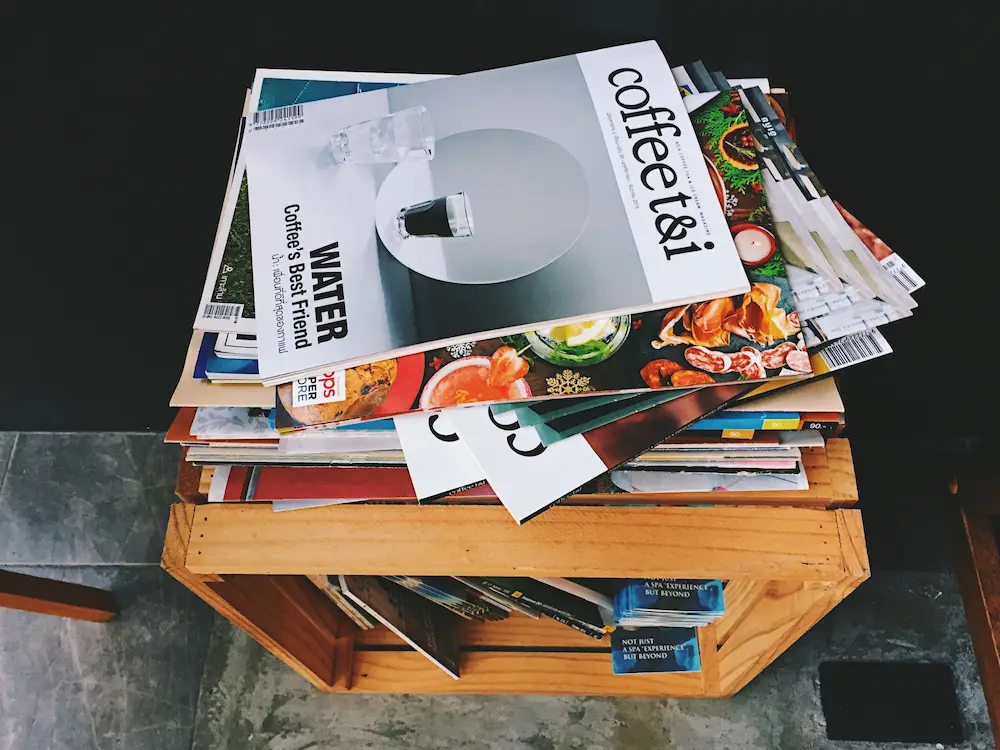 pile of magazines on table